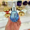 Botellas de esencia de alta gama en stock 30ml botellas de aceite esencial, botellas de líquido originales, botellas recargables, botellas dosificadoras para cuidado de la piel, botellas de diamante, materiales de embalaje
