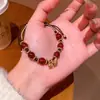 Pulseira de Contas Vermelhas de Cinábrio para o Ano Novo para Mulheres, Mesmo Estilo que a Princesa Fugitiva, Pulseira com Laço, Joias de Mão de Celebridade da Internet Atacado