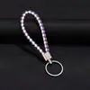 Joyería Tejida Creativa Llavero de Cuerda de Cuero Colgante para Coche Llavero de Cuerda de PU para Pareja Pequeño Regalo Fabricante Bolsa