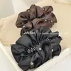Pinza de plátano de nuevo estilo coreano de alta gama con forma de nube y pedrería, Pasador versátil de moda para mujer, Elegante accesorio para el cabello de clip retorcido