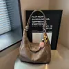 Bolso de hombro casual minimalista transfronterizo 2026 para mujer, gran capacidad, adecuado para ir al trabajo, bolso de axila elegante y versátil, bolso cruzado