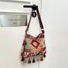 Bolso Bohemio de Borlas de Gran Capacidad 2026 Nuevo Estilo Étnico Nicho Punto Escénico de Xinjiang Bolso Cruzado de Hombro Único para Mujer
