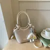 2026 Verano Tendencia Texturizada Estilo Coreano Personalidad de Oficina Moda Bolso Cesta Tejida Bolso Cruzado Bolso Cubo Casual