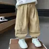 Calça Cargo Casual Nova Outono 2026 Infantil Calça Longa Solta Estilo Coreano Infantil Calça Jogger de Algodão Estilosa Infantil