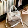 Bolso de Hombro de Diseño de Nicho Simple de Moda para Mujer 2026 Nuevo Bolso de Mano con Bloques de Color Bolso Cruzado Redondo Cilíndrico para el Trabajo