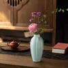 Vaso Cerâmico Chinês Retrô Imitando Garrafa de Melão Azul e Branco da Dinastia Song de Alto Padrão para Sala de Chá Zen Arranjo de Flores Hidropônicas Vasos Ornamentos