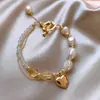 Collar de perlas de agua dulce barrocas extraterrestres, estilo étnico, con pelo amarillo y costuras de cristal, diseño de perla, cadena de clavícula con forma de corazón de melocotón para mujer