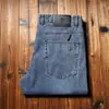 Estação Europeia Primavera e Verão Finos Importados Tanino Microelástico Fornecimento para Convidados Tecido Fixo Masculino Reto Slim-fit High-end Jeans Lavados