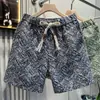 Shorts com cordão para homens verão 2025 estilo hip-hop europeu e americano xadrez jacquard calças esportivas shorts de praia versáteis