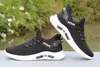 Sapatos Verão 2025 Sapatos de Malha Respirável Sapatos de Pai Masculinos Esportivos e de Lazer Versáteis Antiderrapantes Solado Macio Sapatos Brancos