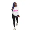 D9405 Venta caliente en Amazon moda casual para mujer europea y americana patrón liso estampado conjunto de dos piezas de pantalones largos