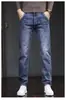 Calça jeans masculina slim fit de perna reta, nova tendência primavera e outono 2026, calça longa casual elástica de alta qualidade para homens