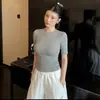 2026 Principios de Primavera Mujer Cuello Redondo Pequeño Manga Media Ajustado Nuevo Versátil Hombro Normal Manga Corta Top Camiseta