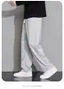 Pantalones de hombre de moda de alta calle, pantalones casuales rectos cropped de nicho de diseñador estilo ins, versión coreana de moda para primavera y otoño