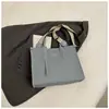 Bolso de lona de gran capacidad para mujer, nuevo bolso bandolera de un solo hombro de alta gama, versátil, para uso laboral, 2025