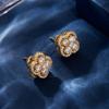 Pendientes de trébol de cuatro hojas giratorios de alta gama, ligeros y lujosos, con microincrustaciones de circonio y aguja de plata s925, estilo occidental, para mujer.