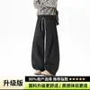 Pantalones negros holgados de pierna ancha, pantalones casuales de primavera/otoño con cordón suelto, pantalones japoneses de moda para hombre con remaches