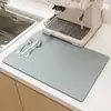 Tapete Drenante de Couro Absorvente de Água de Terra Diatomácea Transfronteiriço para Mesa de Cozinha Doméstica, Resistente a Manchas e Fácil de Cuidar, Pode Ser Personalizado e Enviado