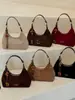 Bolsa de camurça moderna em formato de meia-lua para mulheres, novo estilo 2026, bolsa de ombro fashion, chique e retrô, bolsa crossbody de nicho