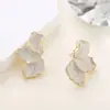 Pendientes de moda de alta gama Pendientes de flor de gota de aceite Mori temperamento lujo ligero pendientes de pétalo de hoja colorida femeninos