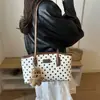 Tendencia transfronteriza bolso de cubo de mano fresco para mujer 2026 otoño nuevo lunares bloques de color bolso de un solo hombro bolso para el hombro para el trabajo