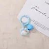 Llavero de pata de gato de resina de dibujos animados con cascabel de gato KT, colgante lindo para niñas, llavero de cuentas DIY, suministro al por mayor