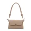 Tendencia transfronteriza bolso de mano cuadrado pequeño fresco para mujer 2026 otoño nuevo elegante hebilla de cierre bolso de hombro único bolso cruzado para ir al trabajo