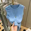 Camiseta sin mangas para mujer Verano 2022 Nueva Camiseta Interior Base Viento de Deseo Puro Chaleco Base Ajustado