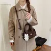 Bolso Boston acolchado con lazo de gamuza de moda estilo coreano para mujer, nuevo modelo 2026, bolso de mano y bandolera, bolso tote pequeño casual