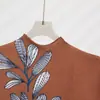 Novo Conjunto Elegante Feminino de Duas Peças para o Verão, Camiseta Estampada de Alta Qualidade, Top de Manga Curta, Saia Drapeada