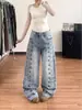 Carpa Tide em estoque estilo corte retrô fivela de metal jeans feminino novo solto faca curva perna larga drapeado calça comprida