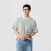 Camiseta casual de alta gama estilo americano con textura a cuadros de manga corta para hombre, nuevo estilo Primavera y Verano 2026, top holgado y cómodo para hombre