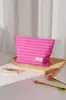 Bolsa de maquillaje simple a rayas bicolor, portátil y artística, adecuada para viajes, almacenamiento de productos para el cuidado de la piel, bolso de mano, bolsa tipo almohada