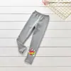 Leggings con orejas de madera para niños de primavera y otoño de comercio exterior de 2023, pantalones de algodón de estilo coreano para bebés, pantalones para niños, pantalones para niñas