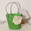 Venta al por mayor de fábrica 5 colores versión coreana de bolsa de paja con flores bolsa portátil para mujer bolsa de paja pequeña fresca bolsa tejida bolsa de playa para vacaciones