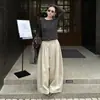 Moda Dopamina de Verano: Camiseta de Punto Calada Verde con Protección Solar para Mujer, Top Cubre-Todo Delgado de Diseño para Verano