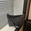 Nuevo bolso de hombro de mezclilla de nicho estilo retro japonés, mochila de lona versátil con bloques de color para estudiantes mujeres