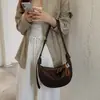 Bolsa grande de alta capacidade estilo retrô para mulheres, nova bolsa transversal versátil de outono 2026, versão coreana bolsa simples de ombro estilo bolinho