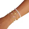 Outono 2024 Estilo Europeu e Americano Nova Moda Pulseira Empilhável com Contas de Pérola Imitação Cruz Simples Acessório