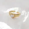 Europa y Estados Unidos red de viento transfronteriza anillo de concha de amor rojo anillo de anillo de fundición de acero de titanio diseño de nicho de moda joyería de anillo