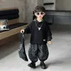 Conjunto de Ropa para Niños de Primavera y Otoño Estilo Coreano Moderno Sudadera y Pantalones Infantiles Conjunto de Dos Piezas 2026 Nuevo Elegante Estampado de Leopardo Ropa Deportiva