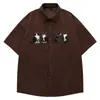 25 Camisas de Manga Curta Bordadas com Gato Estilo Retrô Americano para Homens e Mulheres Verão Veludo Cotelê Caimento Casual Tendência Hip-Hop