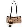 Bolso tipo baguette de alta gama mate estilo coreano para mujer, nuevo modelo otoño 2026, bolso de hombro con lunares texturizados, bolso de moda para el día a día
