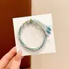 Pulsera de Hilo Rojo de Bebé de Dibujos Animados 2026 Nuevo Estilo Bendición Pequeño Zongzi Pulsera Estilo Chino Festival del Bote del Dragón Hilo de Cinco Colores Ajustable Venta al por Mayor