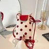 Bolso de teléfono de lunares de venta caliente transfronterizo, nueva moda de verano 2026, simple y versátil, sensación de alta gama, bolso de hombro y cruzado