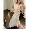 Conjunto casual de dos piezas moderno y versátil para personas petite: conjunto de blusa sin mangas a rayas con amarre y falda