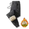 Pantalones de algodón de otoño e invierno para hombre, talla extragrande, forrados de terciopelo de cordero y vellón, gruesos, para otoño, cálidos, sueltos, rectos e informales.