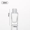 Venta al por mayor, en stock, botella de vidrio cosmética portátil, cesta de flores, cubierta con gotero UV, pequeña botella vacía, botella de aceite esencial cuadrada marrón de 10 ml