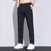 Pantalones largos casuales transfronterizos para hombre elásticos de verano nuevos de seda helada finos marca de moda estilo fino corte ajustado secado rápido pantalones deportivos