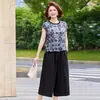 Conjunto de Verão Duas Peças Estampado com Gola Redonda e Manga Curta para Mulheres de Meia-Idade e Idosas, Conjunto Elegante Plus Size para Mães, Conjunto de Calça Reta